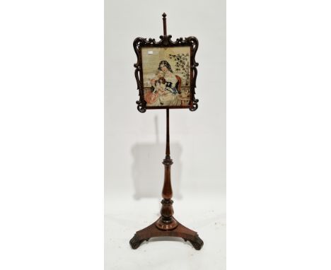 19th century rosewood pole screen, the adjustable rectangular screen having a foliate scroll moulded frame and needlework pan