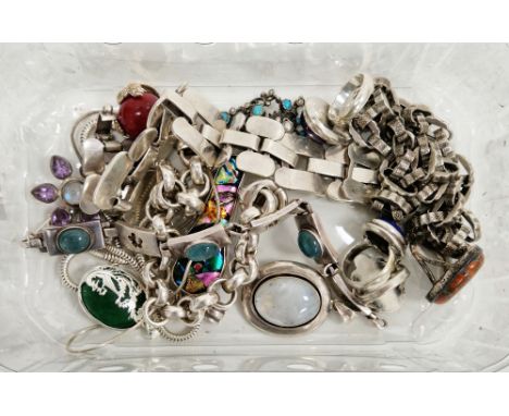 Collection of silver jewellery including a sterling silver fancy link chain, four cabochon set rings, five pendants (one set 