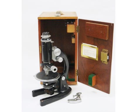 Mid-century black polarising microscope by J. Swift of London, number 26156, 35cm high fitted in mahogany case