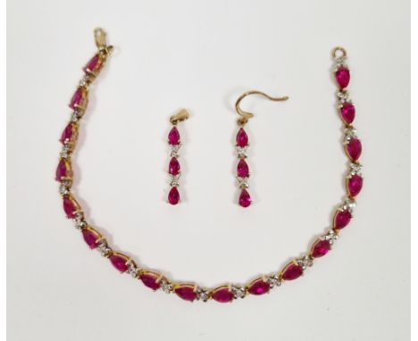9ct yellow gold&nbsp; and red stone bracelet and earring set, the bracelet set with a row of eighteen pear-cut red stones wit
