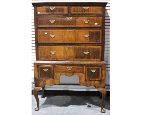 18th century walnut chest on stand, the upper section with moulded cornice over two short and three long graduated cockbeaded