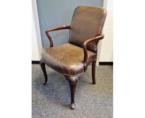 Mahogany framed elbow chair&nbsp;having a studded brown leather upholstered back and seat, shaped arms, on front cabriole leg
