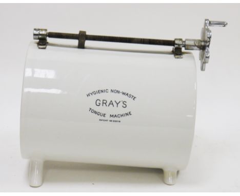 Early 20th century butcher's shop ceramic Gray's ' Hygienic non-waste tongue machine ', the metal screw handle operating a ce