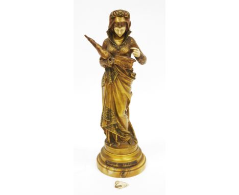 Maurice Constant Favre (1875-1919), gilt bronze figure, Chant de la Fileuse,&nbsp;a standing woman dressed in a draped mediev