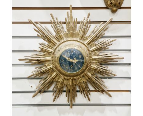 Early 20th century giltwood sunburst wall clock, the blue dial with arabic numerals and single winding hole, 48cm wide&nbsp;C