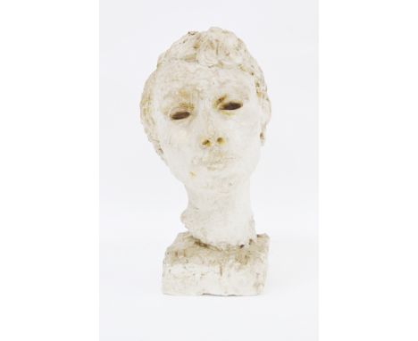 20th century white painted plaster bust of a young person with short wavy hair, on a square plinth base, 39cm high