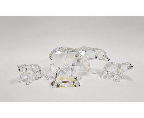 Three Swarovski crystal glass polar bears&nbsp;including a Siku polar bear with iceberg plaque 013747 and pair of polar bear 