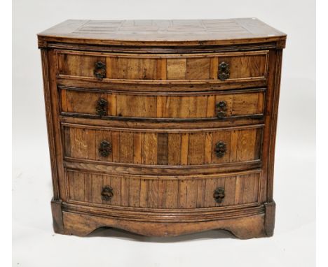 Early 19th century bow-fronted elm and elm veneered chest of drawers, the top with patterned veneers over four long graduated
