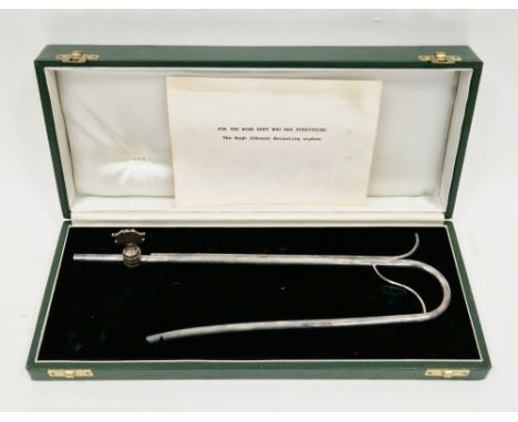 Silver wine syphon, London 1987, William Comyns &amp; Sons Ltd, of typical U shape, fitted in ' The Hugh Johnson Collection '