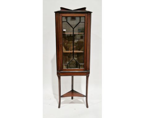 Edwardian mahogany and satinwood inlaid corner display cabinet, the single astragal glazed door opening to a fabric lined int