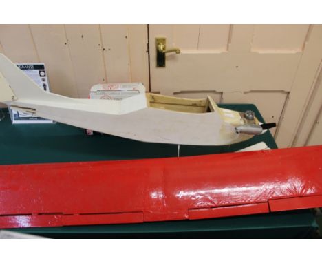 A remote control monoplane with petrol engine, controller and starter, wingspan 51"