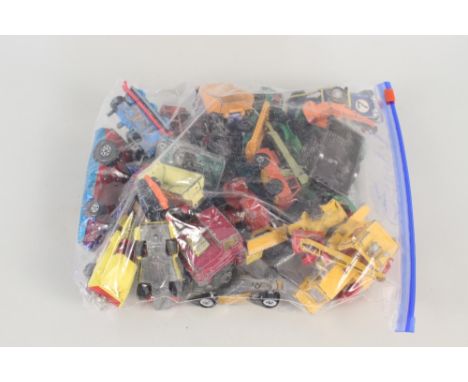 A bag of Corgi and Dinky die cast models