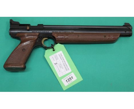 A Crosman model 1377c .177 B/A single shot 'pump' air pistol, with shoulder stock, both boxed and in excellent condition with