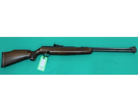 A Weihrauch H.W.77 .22 cal air rifle in overall good condition, with slip and folder of related paperwork, as a post 1939 air