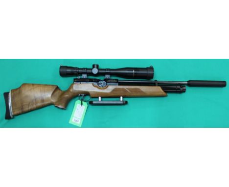 A Weihrauch Sport H.W. 100 P.C.P. .177 cal air rifle, in overall excellent cosmetic condition, complete with sound moderator 