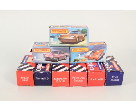 Boxed Matchbox, 3 Porsche Turbo, 1 Dodge Challenger, 4 57 Chevy plus Corgi red and blue box models