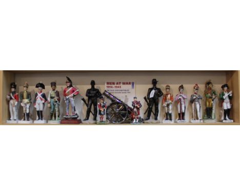 Fourteen various ceramic military figures with a model cannon