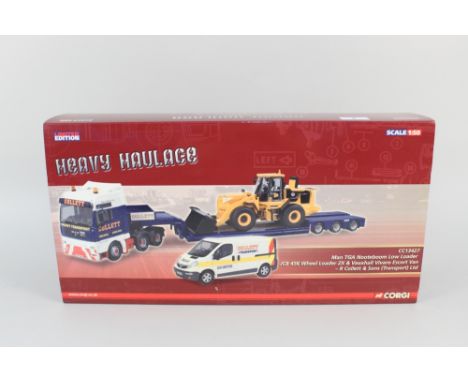 A boxed Corgi heavy haulage Man TGA Nooteboom low loader and JCB 456 wheel loader ZX plus a Vauxhall Vivaro Escort van