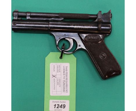 A Webley 'Senior' .177 air pistol, in overall good condition with undamaged brown grips, this example 1946-1958, as a post 19