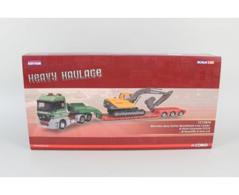 A boxed Corgi heavy haulage Mercedes Benz Actros Nooteboom low loader and Volvo excavator EC210
