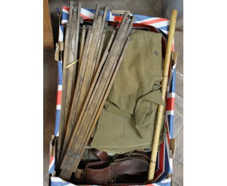 A box of military clothing, Sam Browne and a swagger stick etc