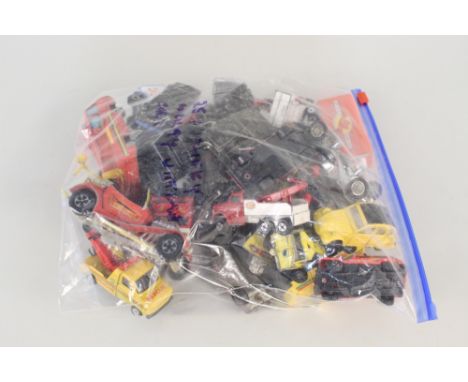 A bag of Corgi and Dinky die cast models