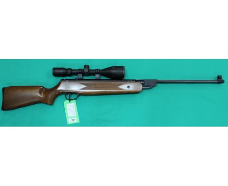 A Hatsan .22 cal model 60/S break barrel air rifle complete with Hawke 3-9x5 scope, tin pellets and Bisley slip, as a post 19