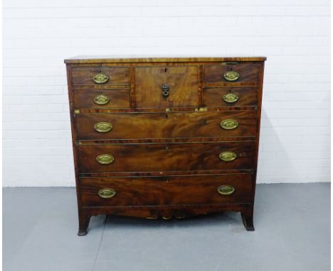 A 19th century mahogany Scotch chest the rectangular top over a central hat drawer flanked by two short drawers over three lo