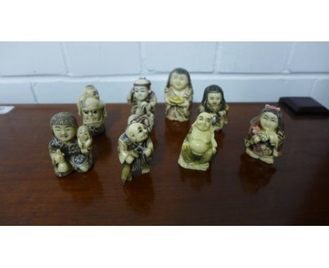 A collection of eight modern netsuke (8) 