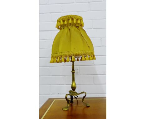 A brass table lamp and shade 