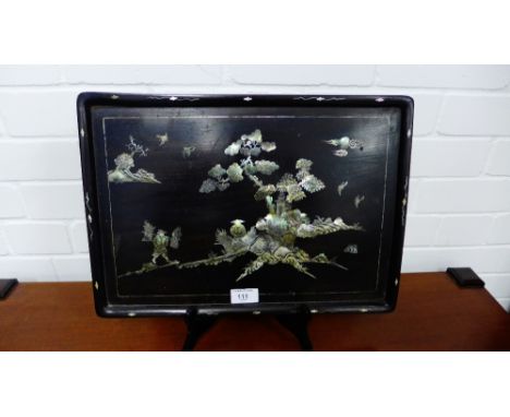 A mother-of-pearl inlaid rectangular tray depicting figures and Pagodas in a stylised landscape, 42cm x 30cm 