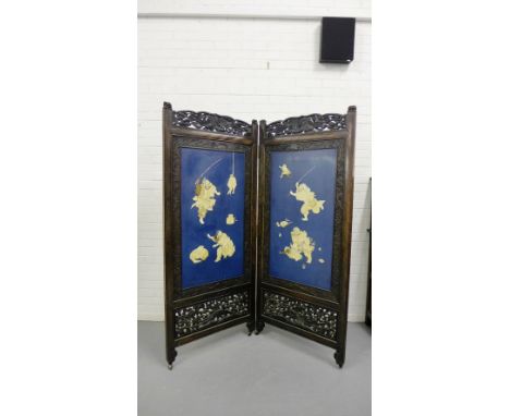 A Japanese Meiji period two-fold lacquered screen depicting Warriors, with carved and pierced frames 154cm x 180cm 