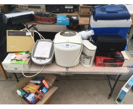 A MIXED GROUP OF ELECTRICALS TO INCLUDE A BREAD MAKER, BACK MASSAGER, GRILLING MACHINE, PLUG IN COOL BOX, TEA MAKER, BOX OF V