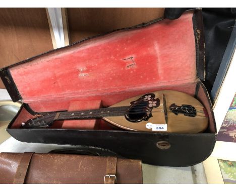 A VINTAGE CASED INLAID DOUBLE STRING MANDOLIN 