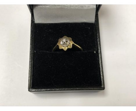 A BOXED 18CT GOLD AND DIAMOND RING 