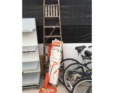 A VINTAGE SIX RUNG WOODEN STEP LADDER AND A FLYMO POWER HOE IN WORKING ORDER 