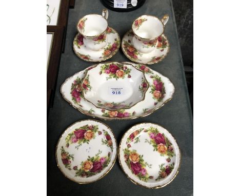 A SET OF ROYAL ALBERT OLD COUNTRY ROSE DESIGN DINNERWARE - CONTAINING EIGHT PIECES INCLUDING CUPS AND SAUCERS 