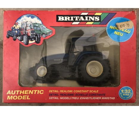 A BOXED 'BRITAINS' NEW HOLLAND TRACTOR MODEL 
