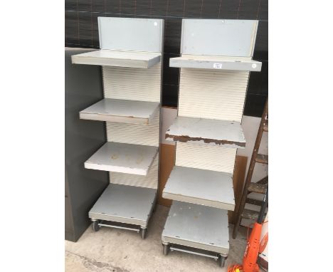 A PAIR OF WHEELED FOUR SHELF SHELVING UNITS WITH BRAKES 43.5CM WIDE. 