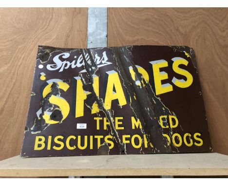 A VINTAGE ENAMEL 'DOG BISCUITS' SIGN 