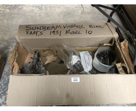 A BOX OF PARTS FOR A MODEL 10, 1931 SUNBEAM, BOXED PISTON, ENGINE CASINGS ETC 