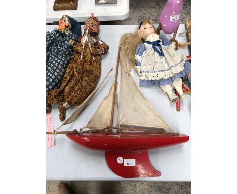 A VINTAGE WOODEN 'STAR ' SAILING BOAT MODEL 