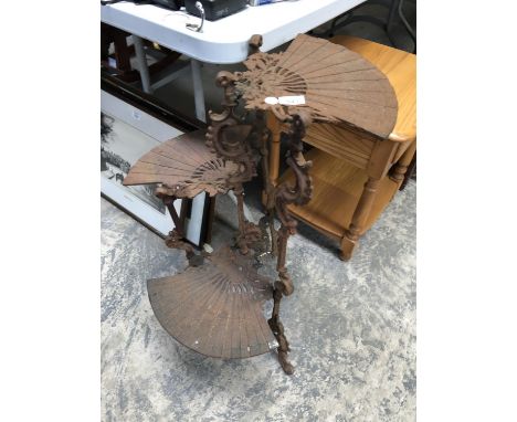 A CAST METAL THREE STEP STAND 