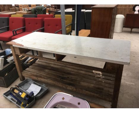 A WOODEN WORK BENCH WITH LOWER SHELF 183CM X 74CM 