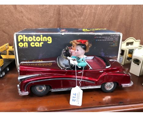 A VINTAGE BOXED ' PHOTOING ON ' CAR, WORKING 
