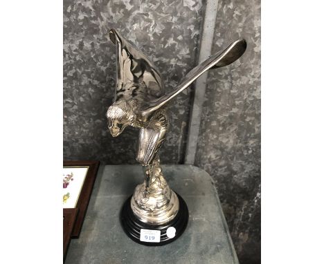 A CHROME STYLE METAL MODEL CAR MASCOT OF A FLYING LADY 