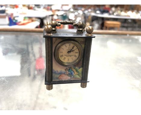 A MINIATURE CARRIAGE CLOCK WITH PAINTED DESIGN 