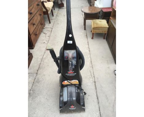 A BISSELL POWERWASH CARPET CLEANER IN WORKING ORDER 