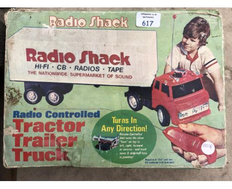 A VINTAGE BOXED 'RADIO SHACK' RADIO CONTROLLED TRACTOR TRAILER TRUCK 