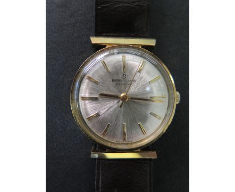 A rare gents Breitling Geneve Automatic wristwatch gold plated case with brushed sunburst face and tapered gilded baton marke